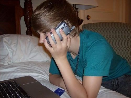 Justin Bieber on  cell phone .