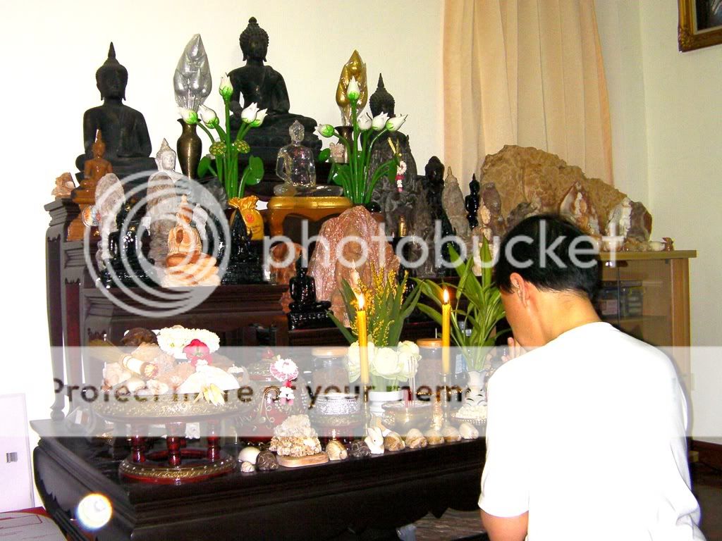 Paying respect to the Lord Buddha in my Buddhas room (A deva ball 