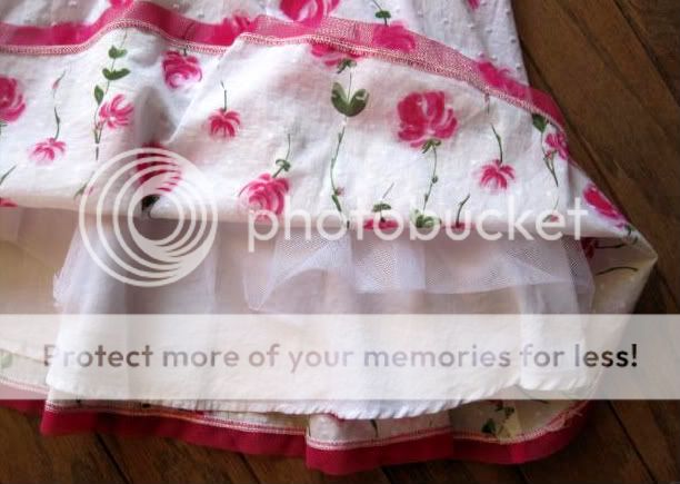 This listingis for a beautiful pink and white eyelet dress by Pinky 